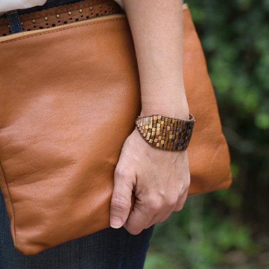 Make this simple ombre beaded cuff from leather, waxed linen and