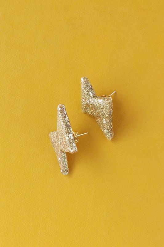 Picture Of glittery gold 90s inspired diy thunderbolt earrings to make 3