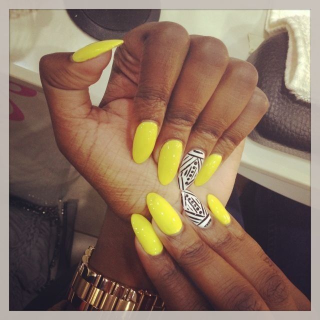 Yellow with black and white tribal accent nail | Gel nails