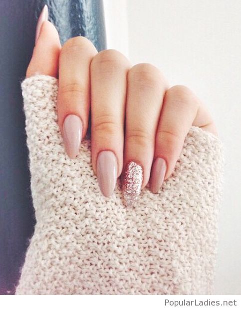 Long nude nails with glitter