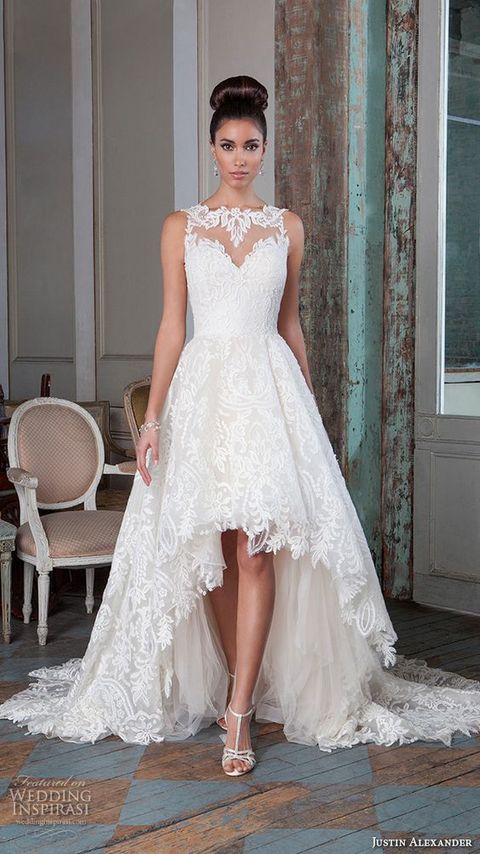 Picture Of an illusion neckline lace dress with a high low skirt