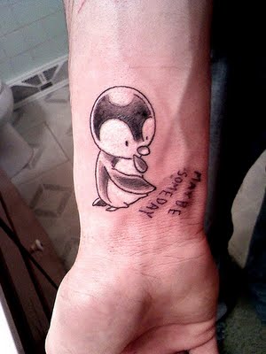 Cute Small Penguin Tattoo On Wrist