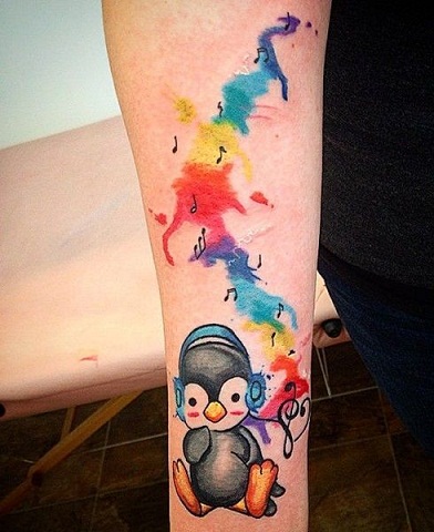9 Lovable & Creative Penguin Tattoos for Women and Men
