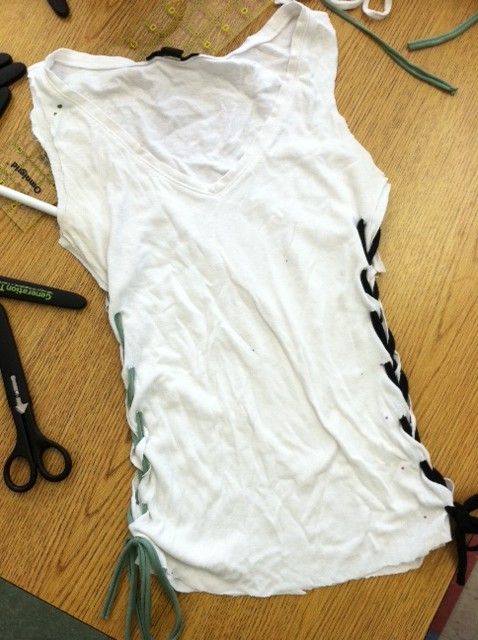DIY Tee! Cut into a tank nd laced together on the sides! Then write