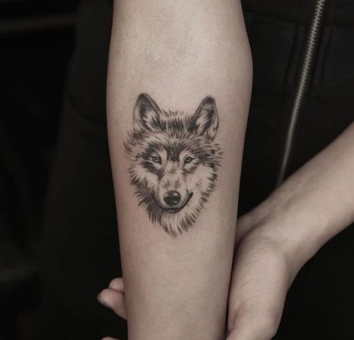 Small Wolf Women Tattoo Ideas