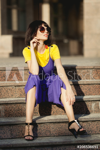 Bright summer trend. Fashion portrait of stylish young woman with