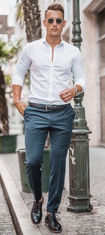 Summer outfit inspiration with a white button up shirt with rolled