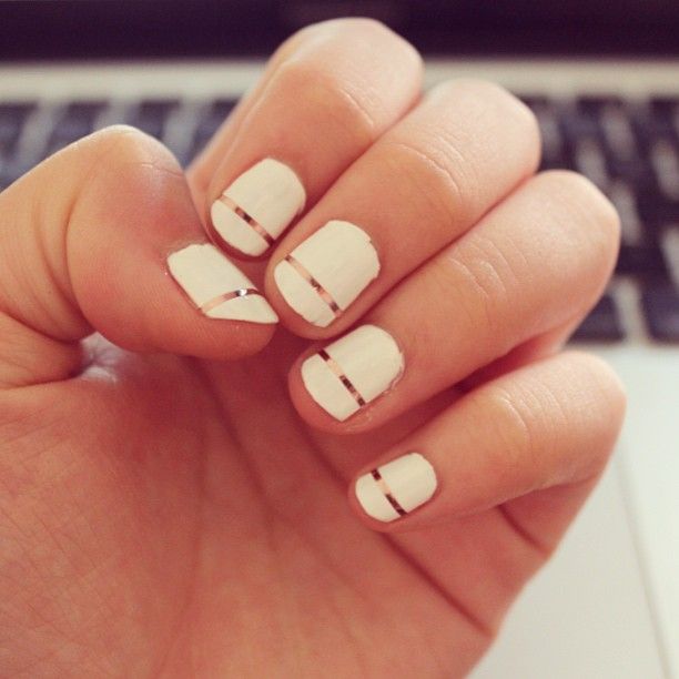 Cute white manicure with a gold stripe by cindyfeng92. Submit your