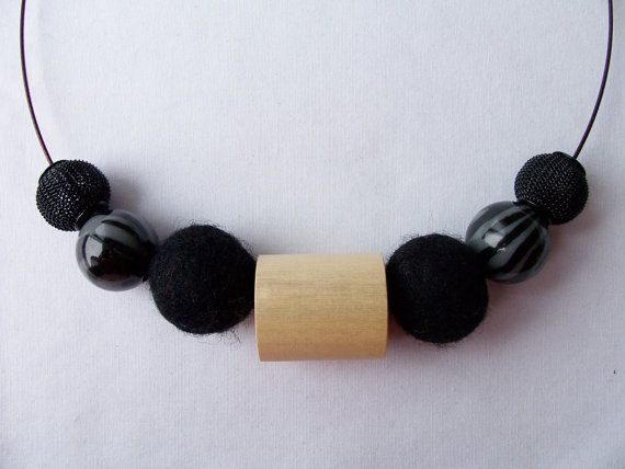 Felt, wood and metal necklace by Sparkle andComfort, $12.00